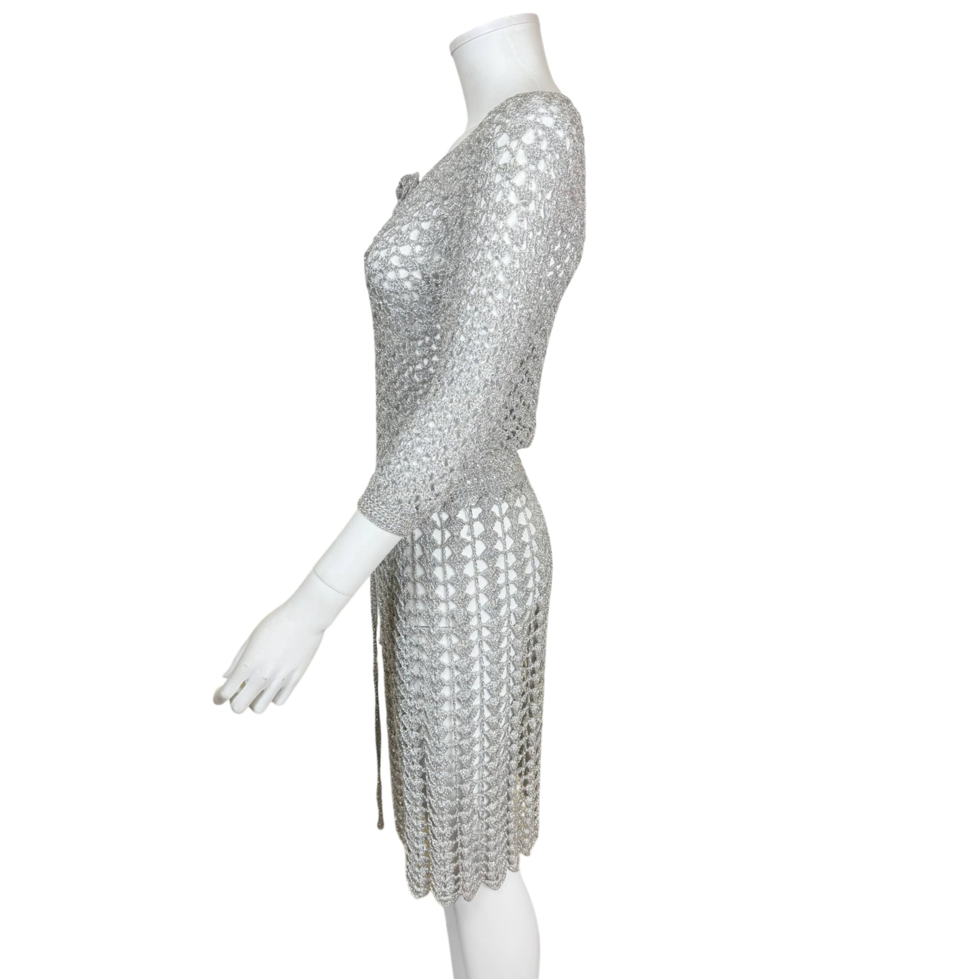 left side view of vintage 1960s silver metallic crochet dress