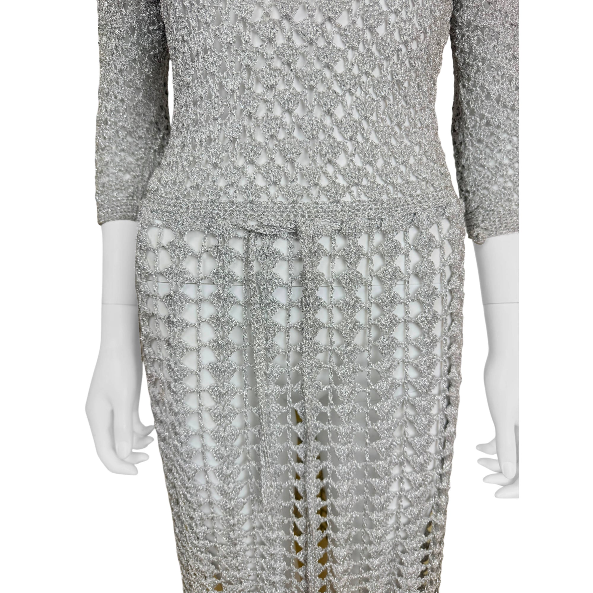 detailside  of vintage 1960s silver metallic crochet dress