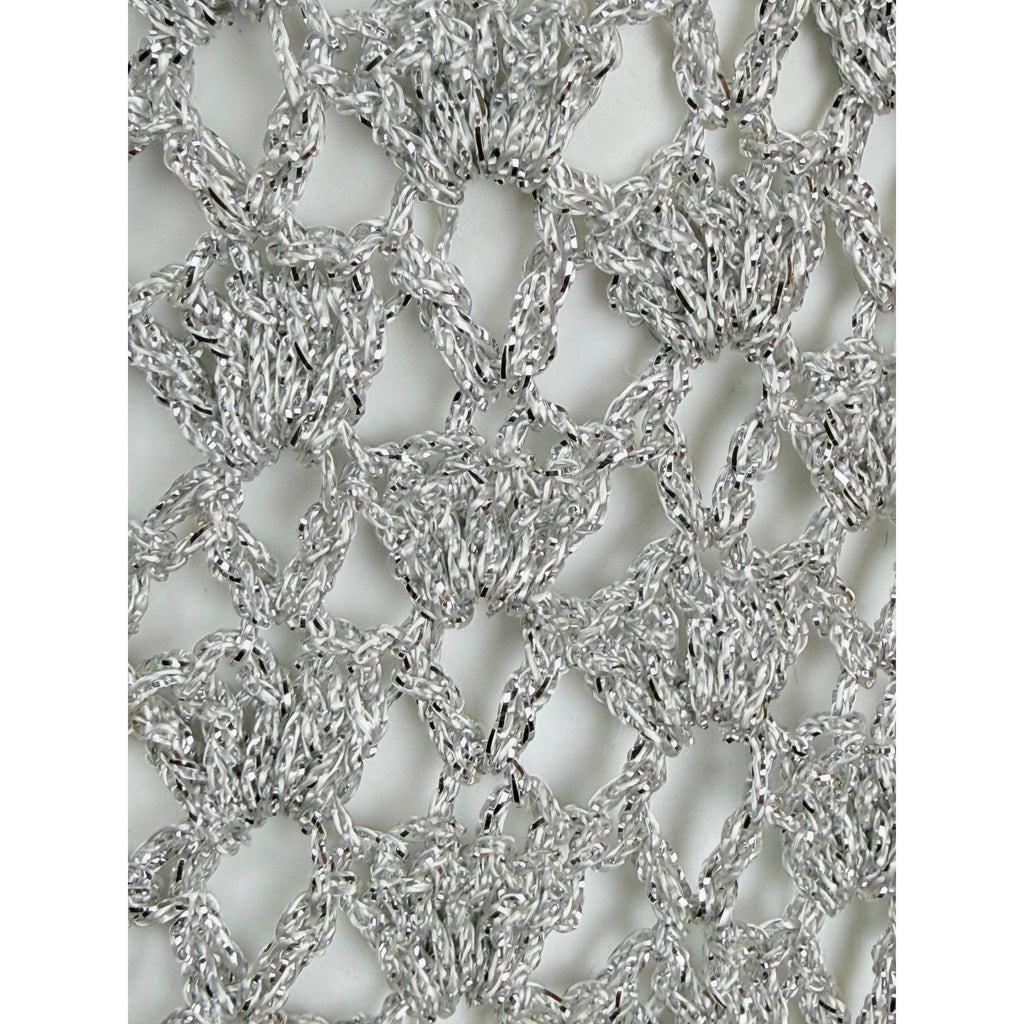 extreme close-up of metallic yarn kni
