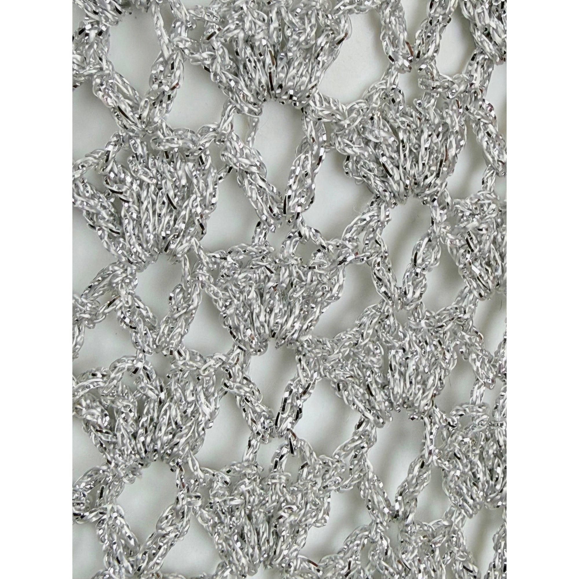 extreme close-up of metallic yarn kni