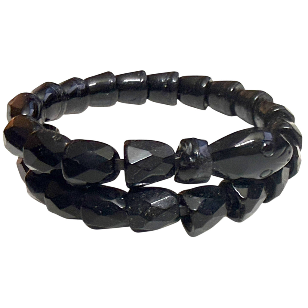 Antique Victorian jet snake coil bracelet with two rows of faceted black beads and sculpted serpent head