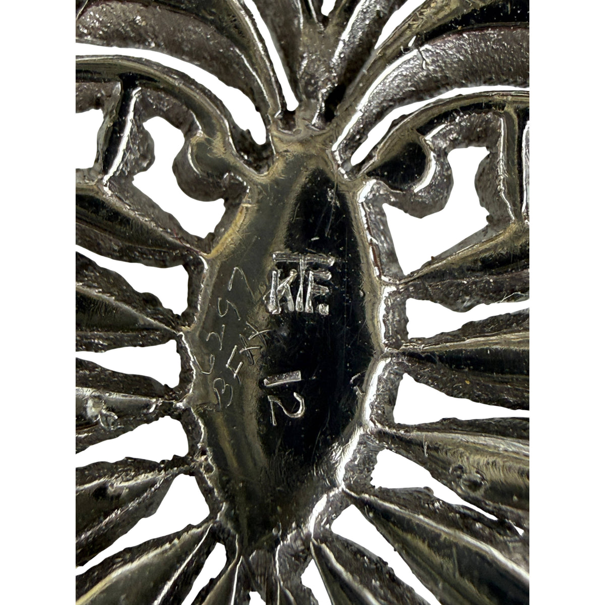 KTF Trifari mark on 1930s dress clip