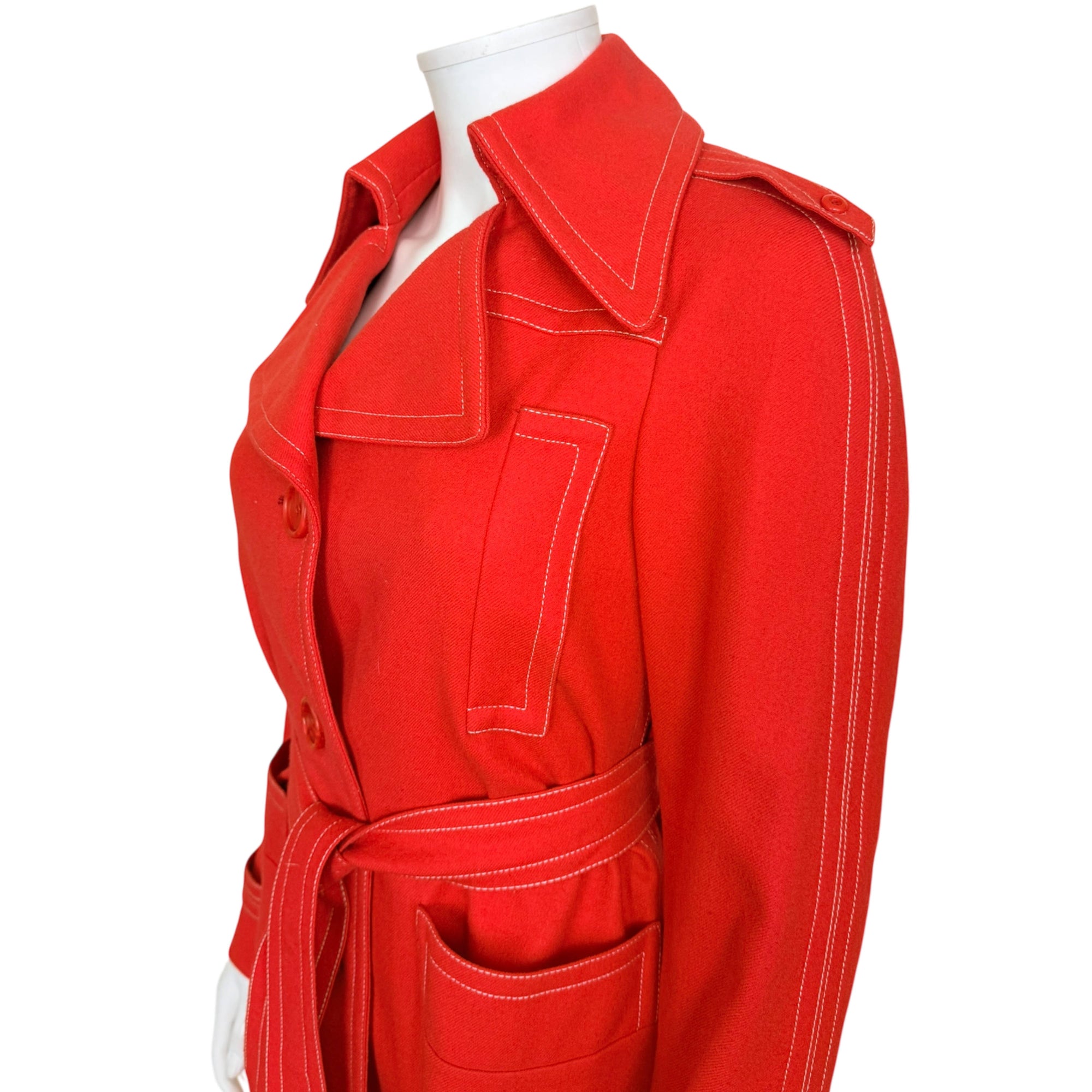 Detail of vintage 1970s Ted Lapidus Paris red wool belted jacket Exclusive Boutique France