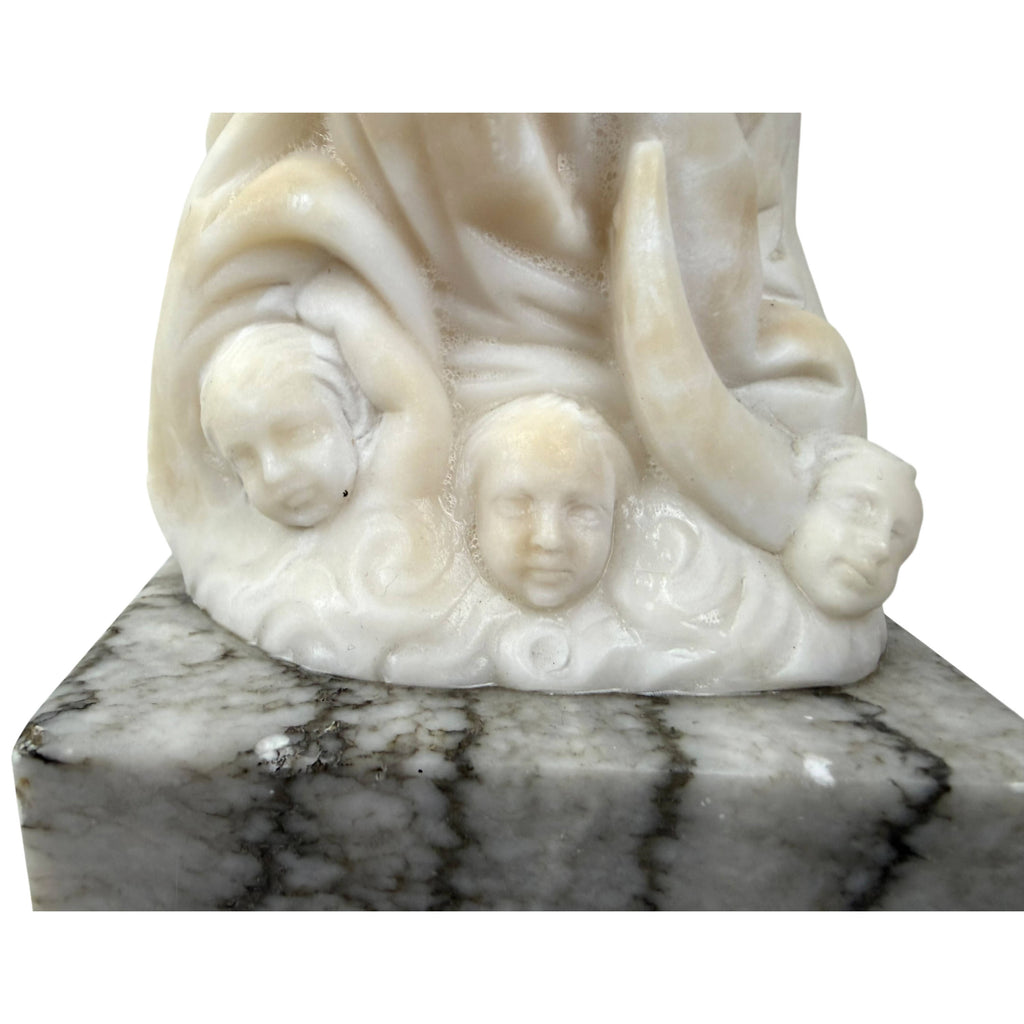 Early 20th century religious alabaster sculpture with cherubs