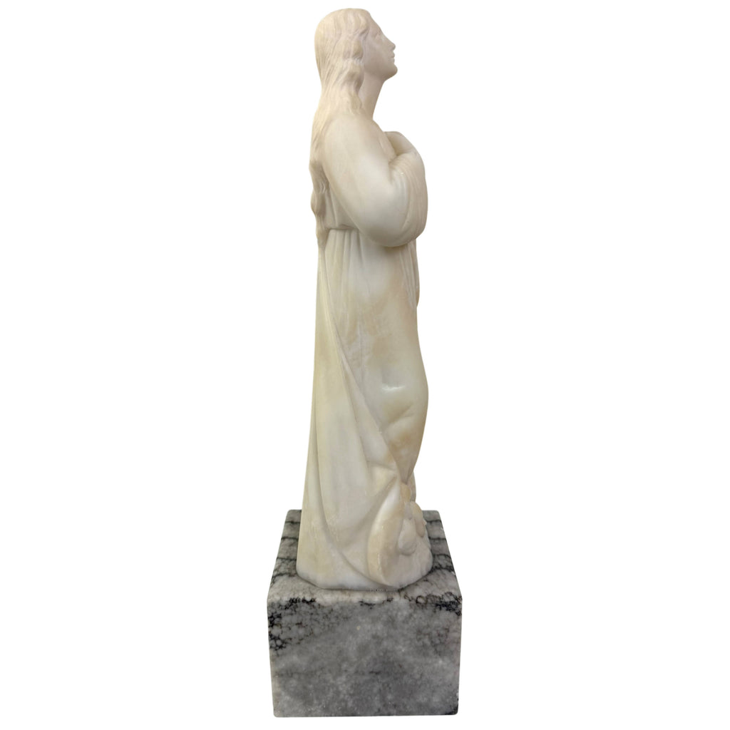 antique Catholic church statue in alabaster and marble