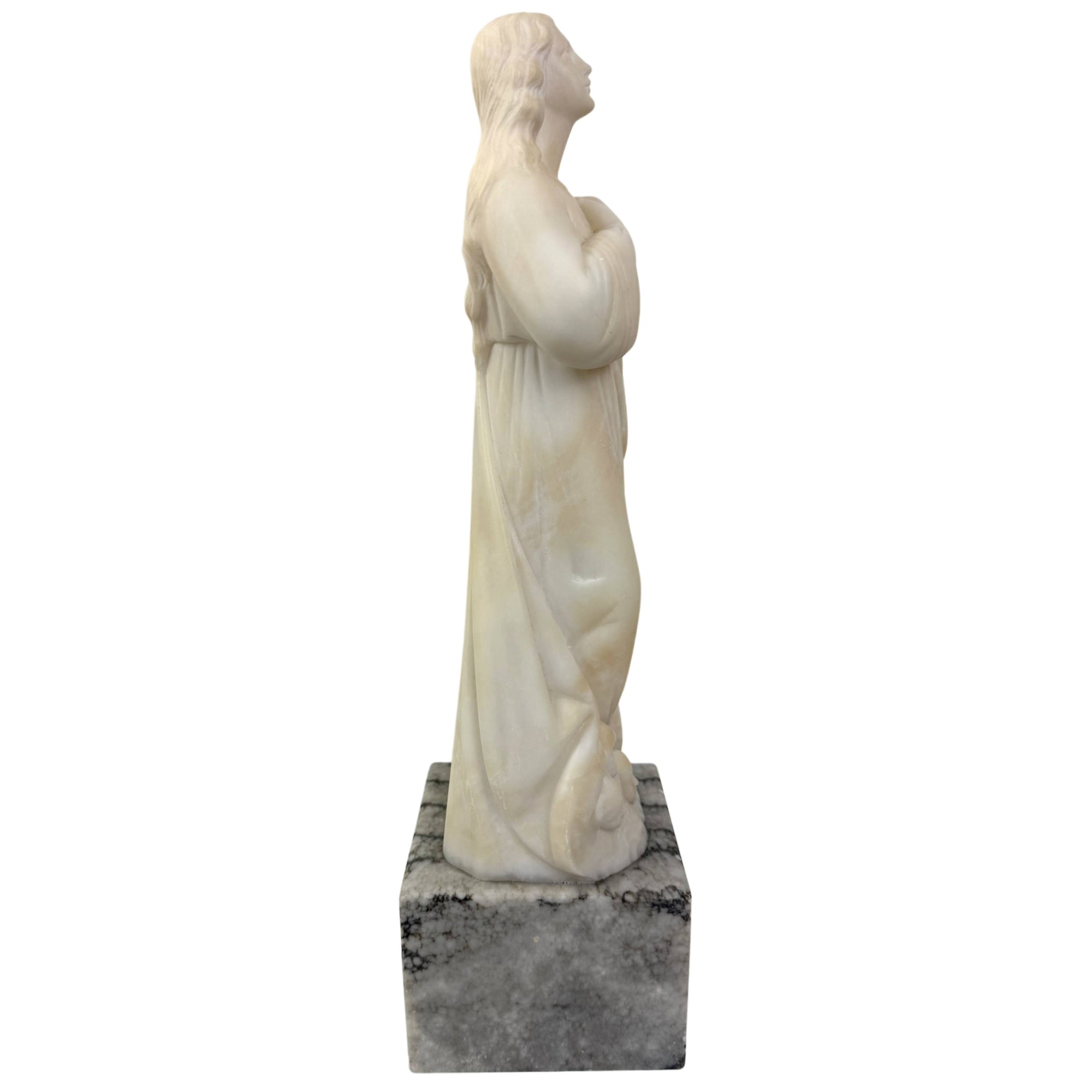 antique Catholic church statue in alabaster and marble