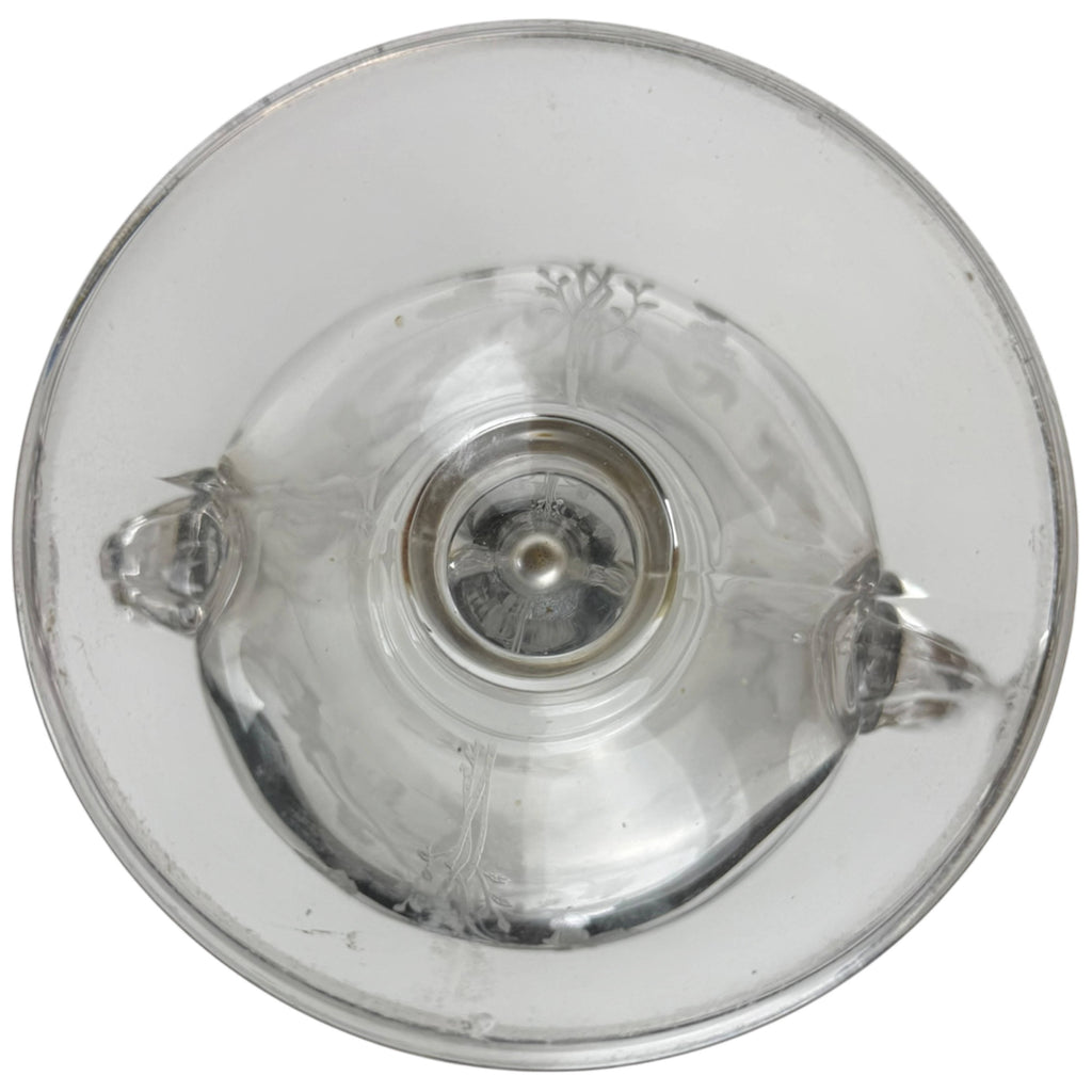 underside of footed glass vase