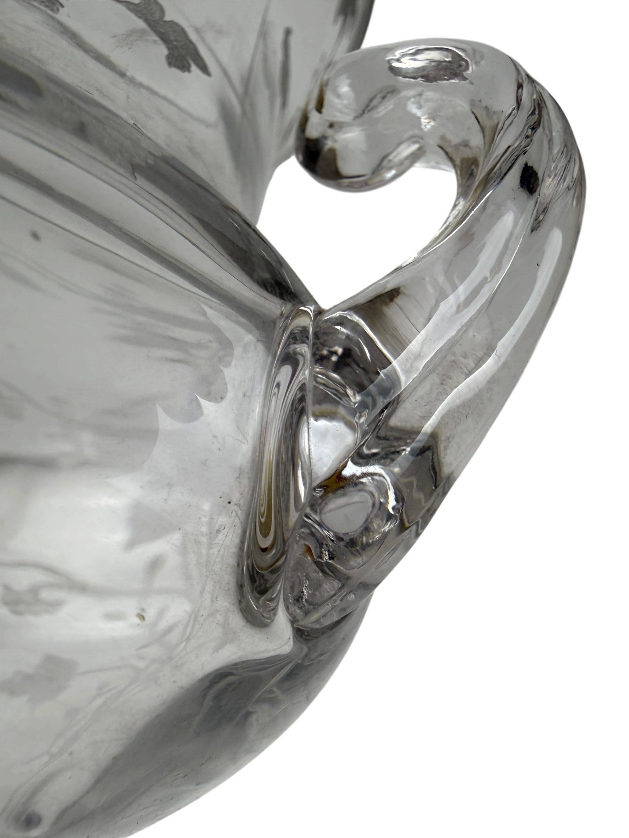 detail of applied handle to glass vase