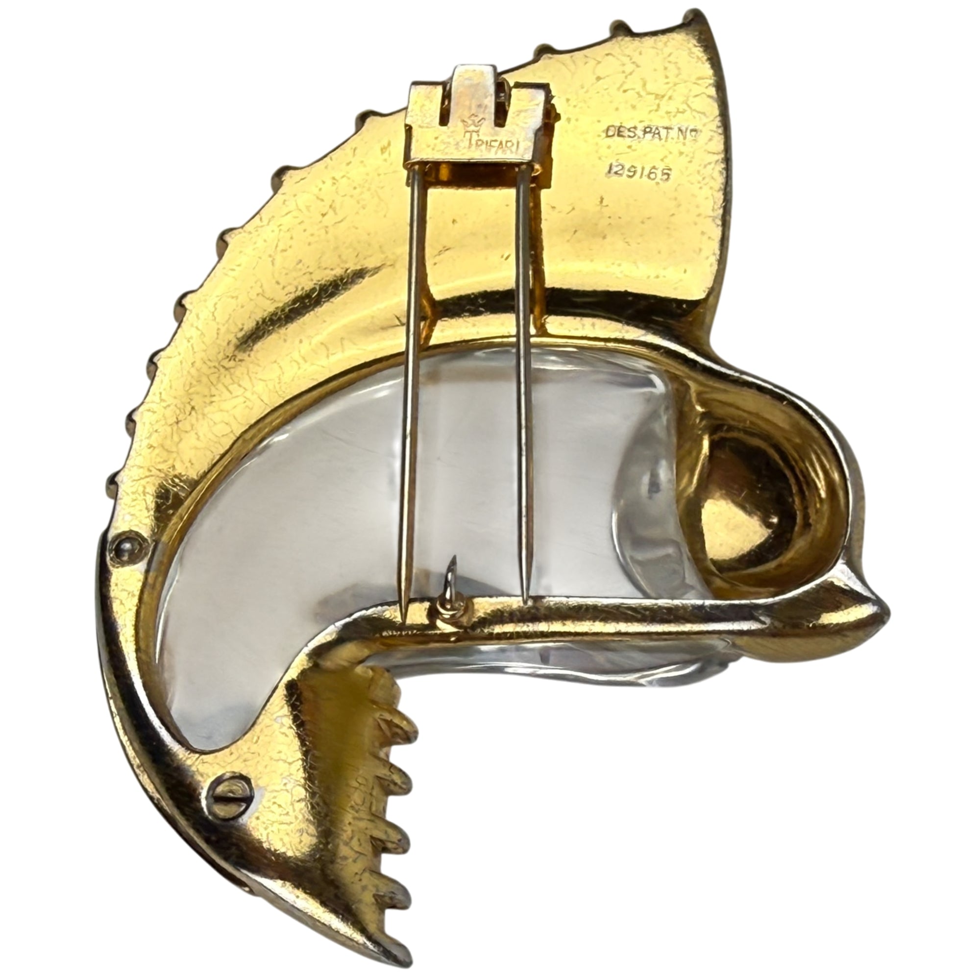 backside of Trifari sailfish brooch with lucite jelly belly and rhinestone fin