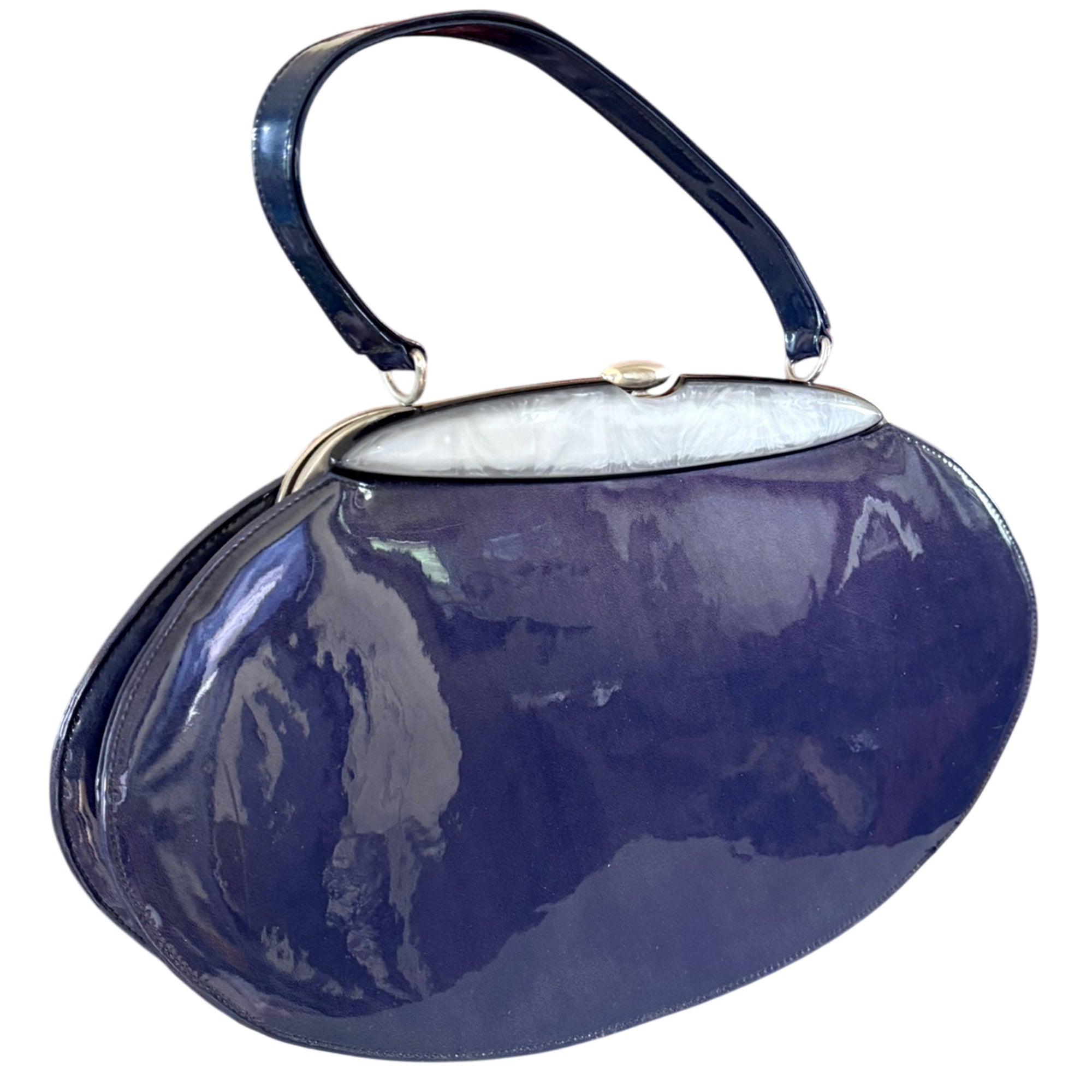 Large mid-century purplish blue patent leather Tudor handbag with structured metal frame
