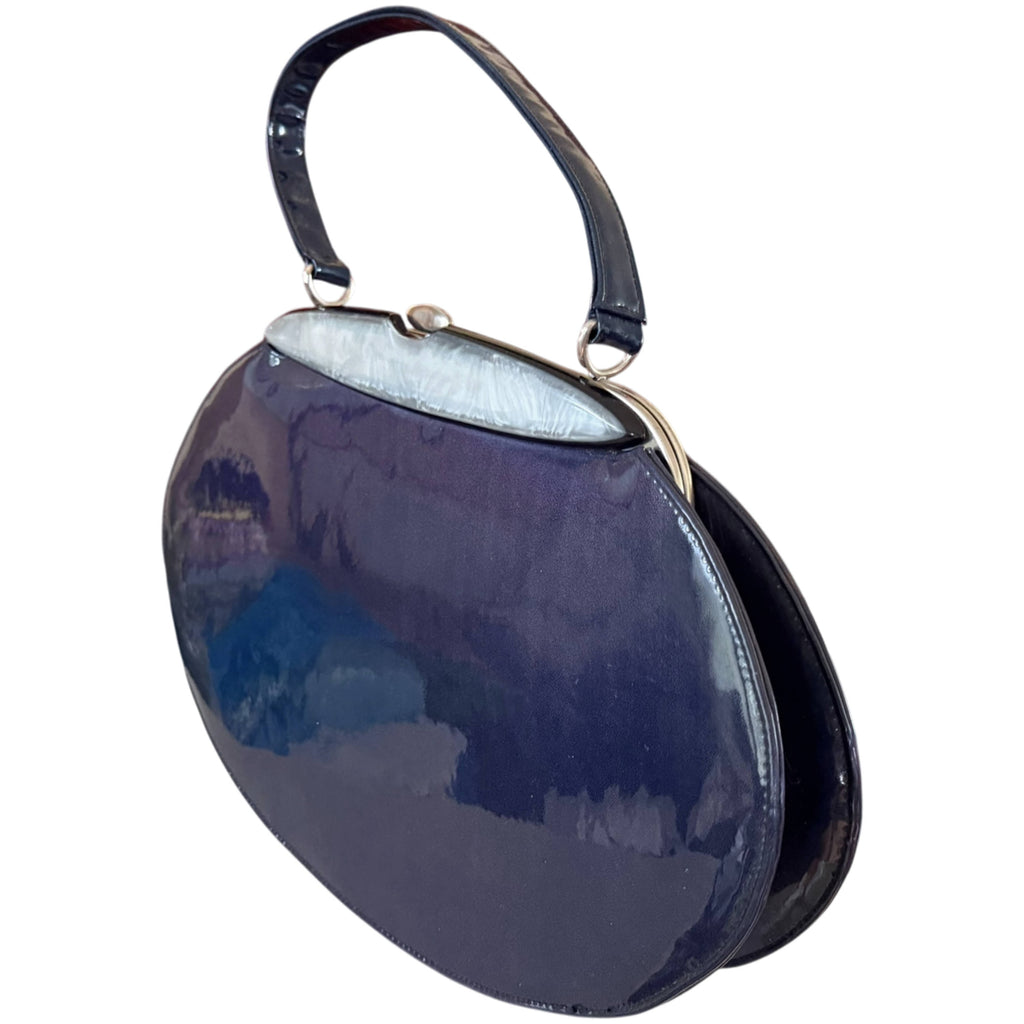 Vintage Tudor Bag purplish blue patent leather handbag with grey pearlescent Lucite frame panel