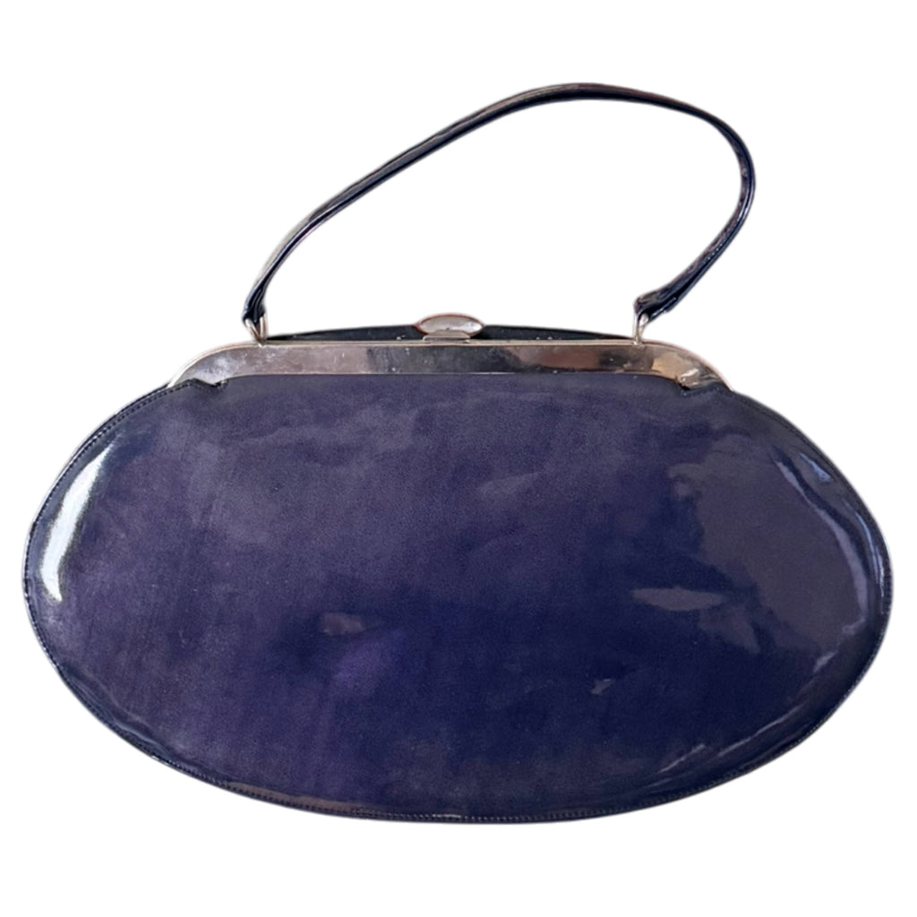 Vintage Tudor Bag purplish blue patent leather handbag back showing glossy finish