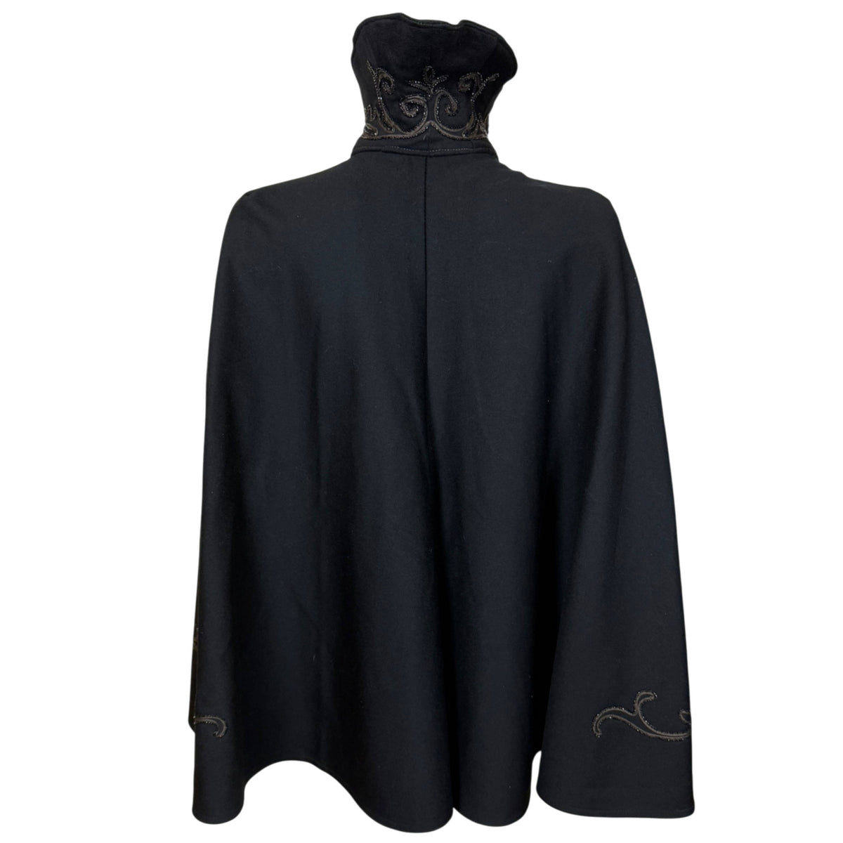 Full back view of late Victorian black wool cape showing flared silhouette and broad hemline