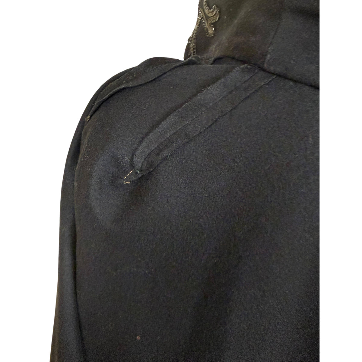 close up of shoulder pleating on interior of victorian cape