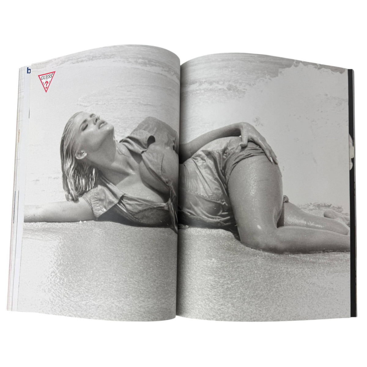 Anna Nicole Smith Guess fashion advertisement photographed in black and white in Vogue February 1993
