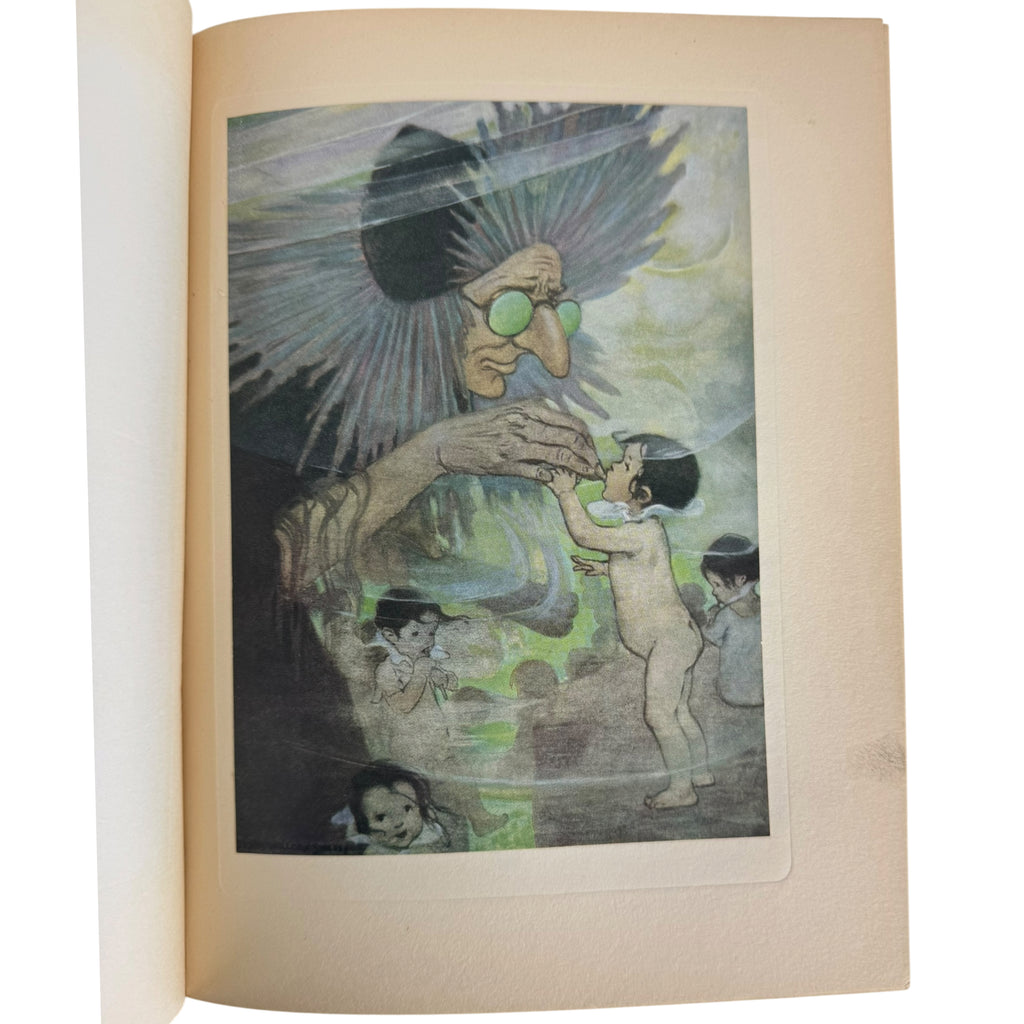 the water babies book showing a cream-colored page with a central illustration of a surreal scene by jessie wilcox smith. The artwork depicts a large hand reaching toward two children, with a dark winged figure above and green glowing orbs in the air.