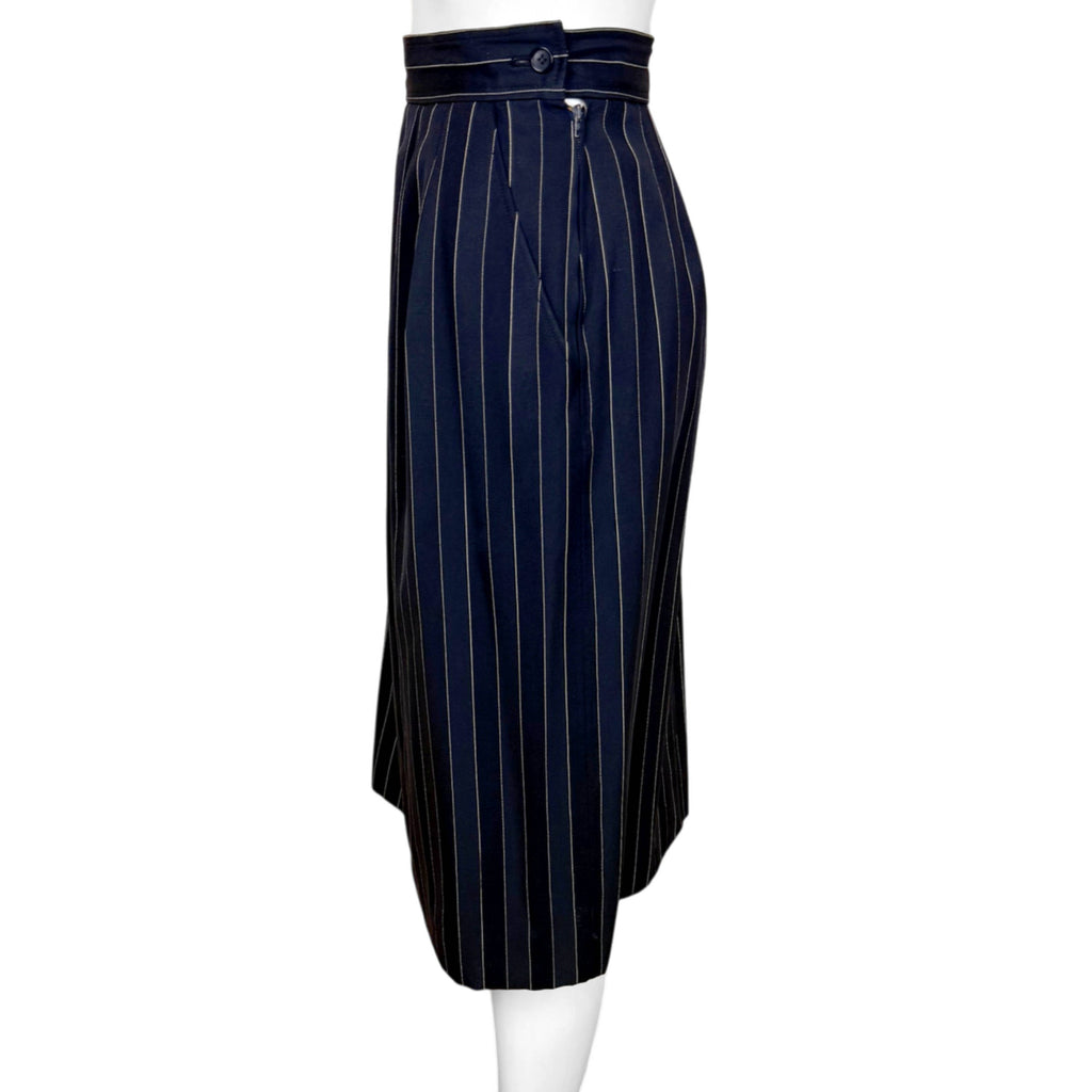 Side view of Yves Saint Laurent pinstripe skirt showing waistband, button and metal zipper