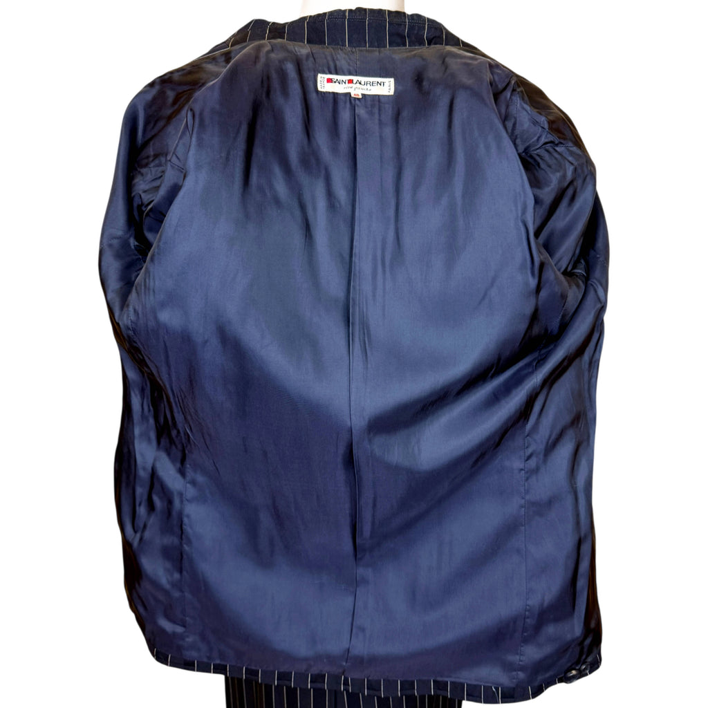 Interior of Yves Saint Laurent Rive Gauche jacket showing navy lining and designer label